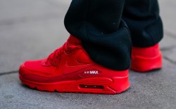 A guest wears red Air Max Nike sneakers, during London Fashion Week September 2019 on September 13, 2019 in London, England.