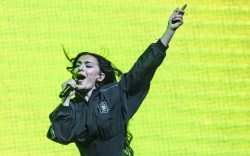 LONDON, ENGLAND - JUNE 27: Charli XCX joins Troye Sivan on stage during the Something to Give Each Other Tour at OVO Arena Wembley on June 27, 2024 in London, England. (Photo by Katja Ogrin/Redferns)