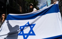 Demonstrators in support of Israel rally near the Consulate General of Israel in New York City on October 9, 2023. Palestinian militant group Hamas, which dragged off about 150 hostages in its surprise weekend assault on southern Israel, threatened on Monday to kill them if Israeli air strikes continue "targeting" Gaza residents without warning. (Photo by Adam GRAY / AFP) (Photo by ADAM GRAY/AFP via Getty Images)