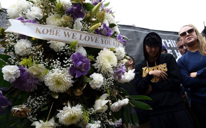 A floral wreath honoring Kobe Bryant appears outside of Staples Center prior to the start of the 62nd annual Grammy Awards, in Los Angeles. Bryant died Sunday in a helicopter crash near Calabasas, Calif. He was 41Kobe Bryant, Los Angeles, USA - 26 Jan 2020