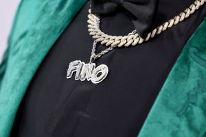 NEW YORK, NEW YORK - JUNE 22: A detailed view of the necklace of Jalen Hood-Schifino arrives prior to the first round of the 2023 NBA Draft at Barclays Center on June 22, 2023 in the Brooklyn borough of New York City. NOTE TO USER: User expressly acknowledges and agrees that, by downloading and or using this photograph, User is consenting to the terms and conditions of the Getty Images License Agreement. (Photo by Arturo Holmes/Getty Images)