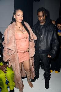 PARIS, FRANCE - FEBRUARY 28: (EDITORIAL USE ONLY - For Non-Editorial use please seek approval from Fashion House) Rihanna and ASAP Rocky attend the Off-White Womenswear Fall/Winter 2022/2023 show as part of Paris Fashion Week on February 28, 2022 in Paris, France. (Photo by Pascal Le Segretain/Getty Images)