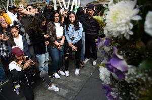 People gather at a makeshift memorial honoring former NBA player Kobe Bryant outside of the Staples Center prior to the start of the 62nd annual Grammy Awards at the Staples Center, in Los Angeles. Bryant died Sunday in a helicopter crash near Calabasas, Calif. He was 41
Kobe Bryant, Los Angeles, USA - 26 Jan 2020